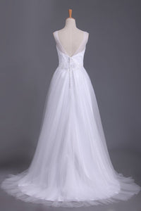 A Line V Neck Open Back Wedding Dresses Tulle With Ruffles And Handmade Flowers